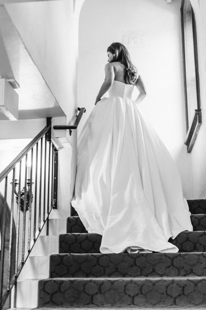 bride walking up stairs