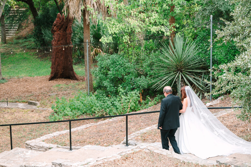 bride and father walking down the aisle