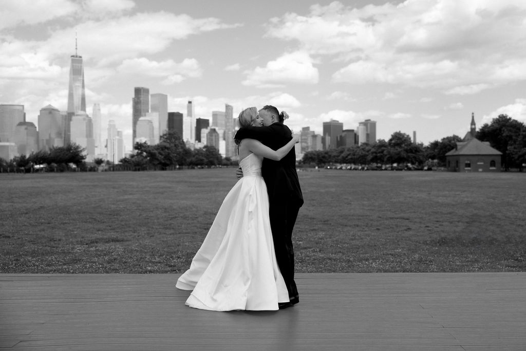 bride and groom hugging