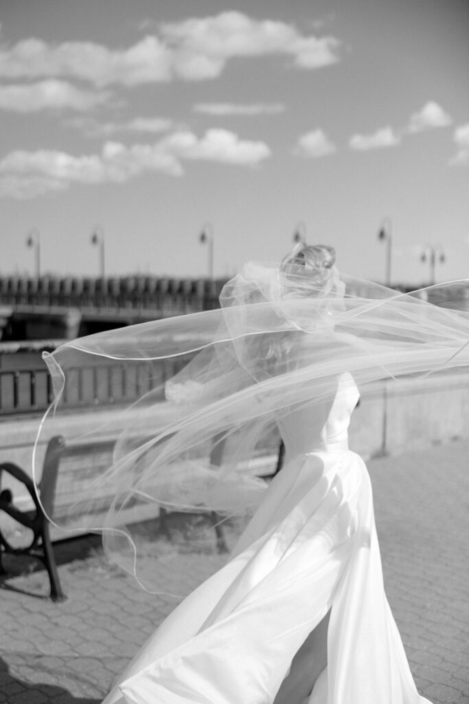 bride's veil in caught in the wind